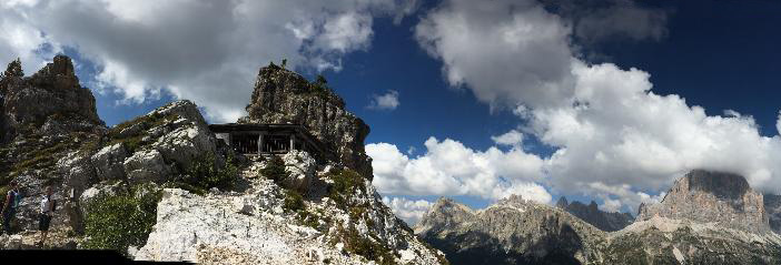 Panoramic shot of ridges and peaks in a mountain range.