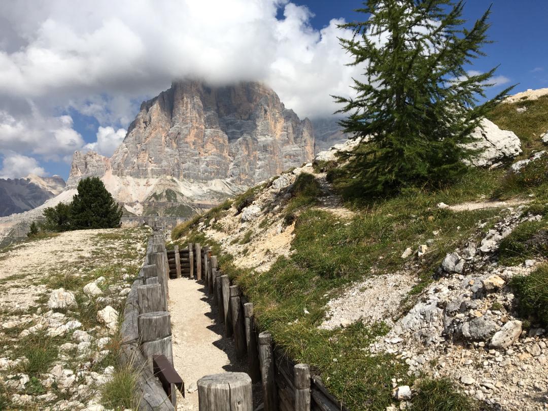 A trench line since turned into a hiking trail cut into the side of a mountain.