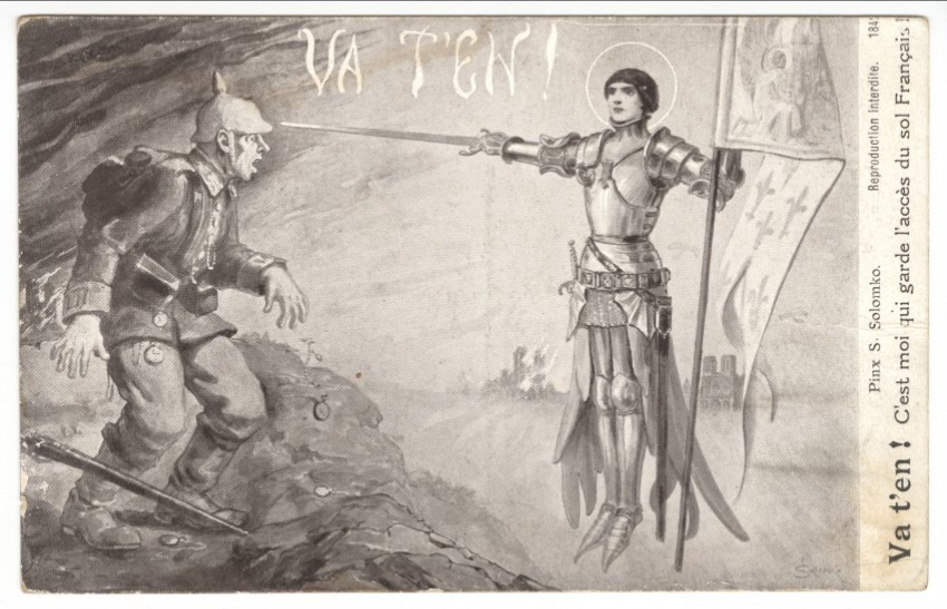 Black and white postcard in French of a scared German soldier dropping his weapon as he looks at Joan of Arc, in her armour with sword drawn and a saint's halo surrounding her head. Caption on print, transcribed: "VA T'EN!" [translated: Go Away!]. Text on side of postcard in French, transcribed: "Va t'en! C'est moi qui garde l'acces du sol Francais!"