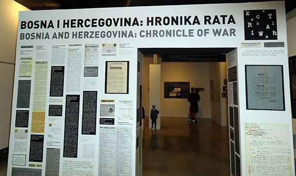 Museum display of newspapers and broadsides