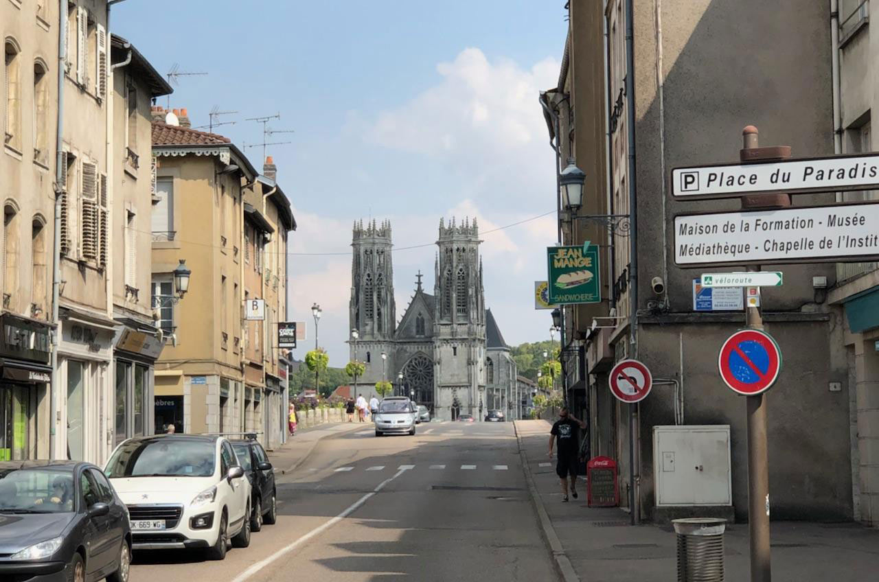 View down the street of a modern French village.