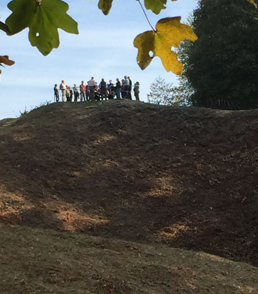 Tour group gathered on the top of a hill