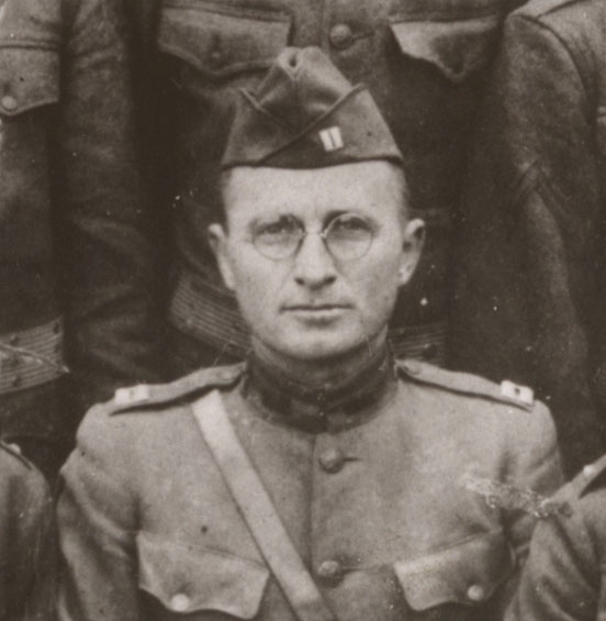 Black and white photograph of a young Harry Truman in military uniform
