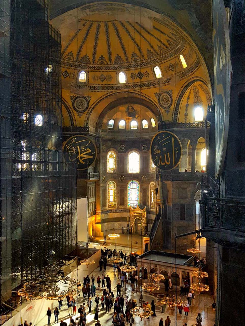 Interior of the Hagia Sophia, glowing gold in the light