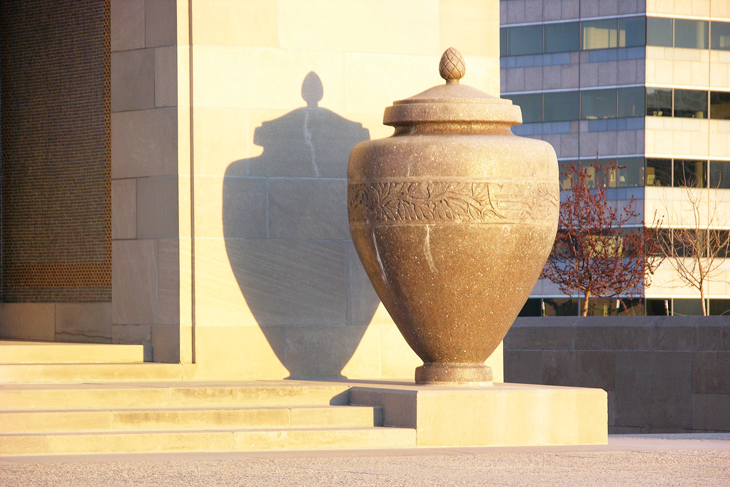 Large stone urn taller than the average person