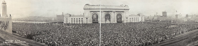 Black and white panoramic view of Union Station from the vantage point of Liberty Memorial Hill. The grounds are covered in people.