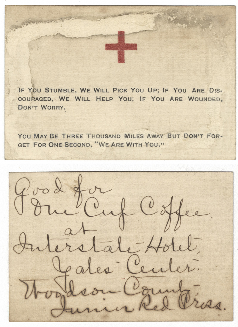 Front scan: A red cross and typewritten text. Back scan: Handwritten note.