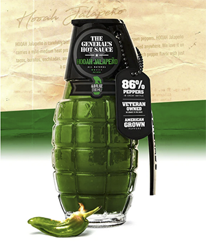 Photograph of a glass jar shaped like a grenade filled with green hot sauce