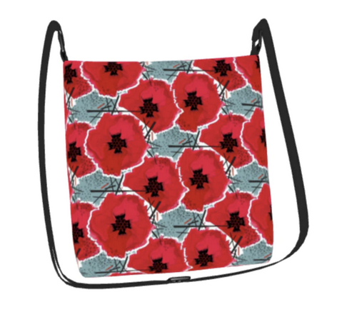 Photograph of a crossbody purse printed with poppies