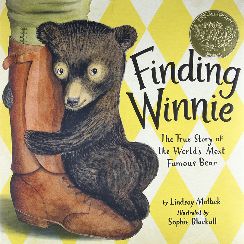 Book cover illustrating a black bear cub hugging a soldier's boot. Text: 'Finding Winnie'