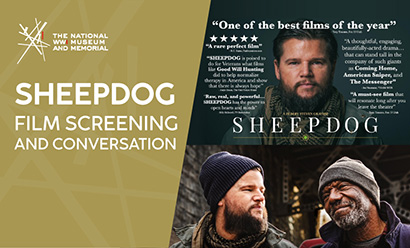 Modern film still of a bearded white man and a bearded black man, both wearing beanie hats and winter coats, smiling at each other. Text: 'SHEEPDOG'