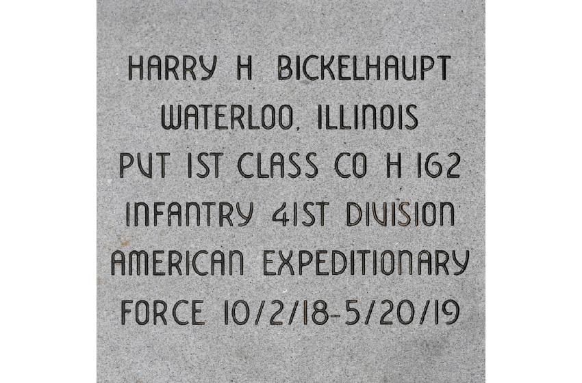 Grey square granite brick inscribed 'HARRY H BICKELHAUPT / WATERLOO, ILLINOIS / PVT 1ST CLASS CO H 162 / INFANTRY 41ST DIVISION / AMERICAN EXPEDITIONARY / FORCE 10/2/18-5/20/19'