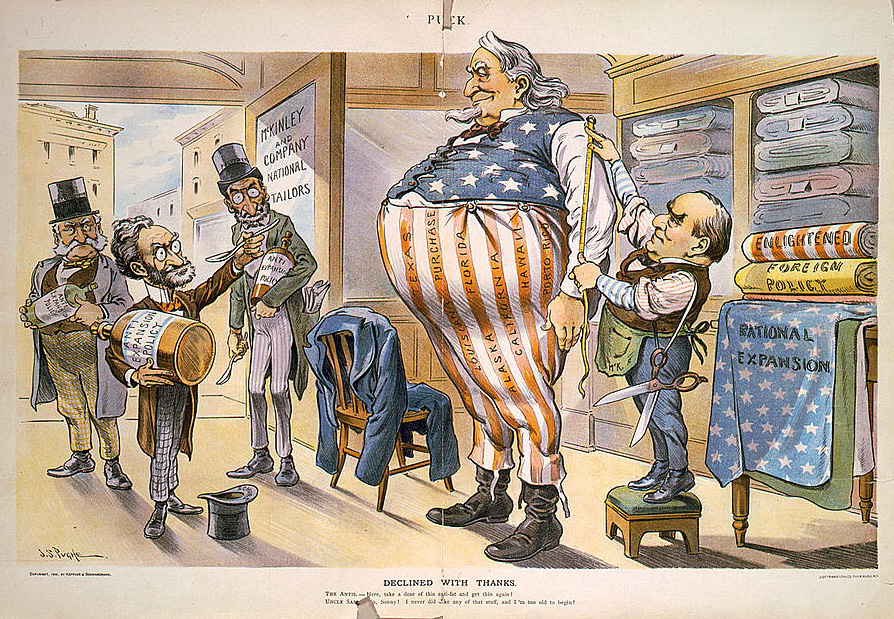 Cartoon showing Uncle Sam as a large, fat man, being measured for clothing as he debates with anti-expansionists.