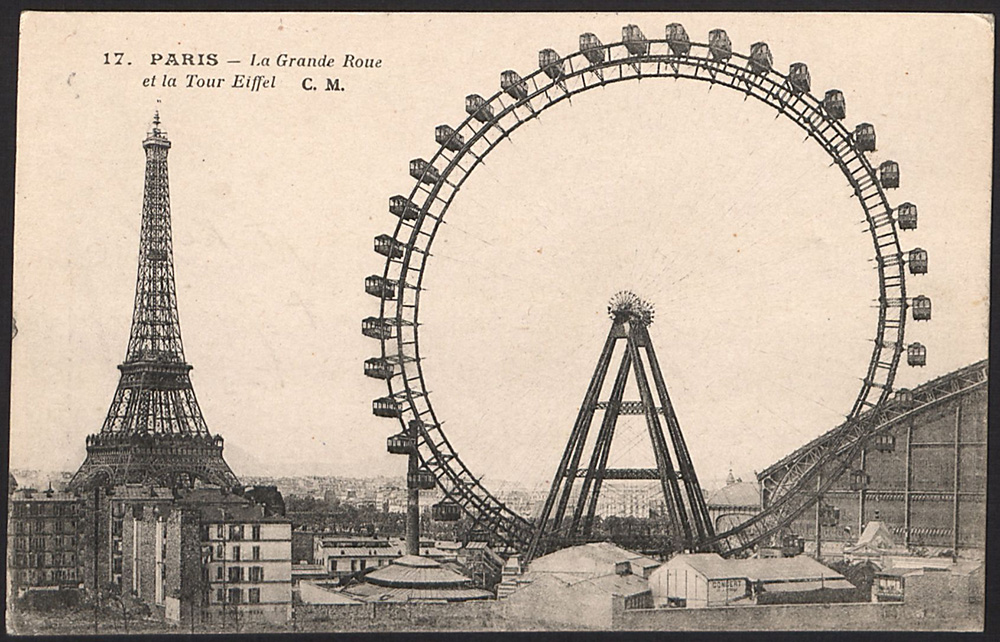 Black and white photo of the Eiffel Tower and a Ferris wheel