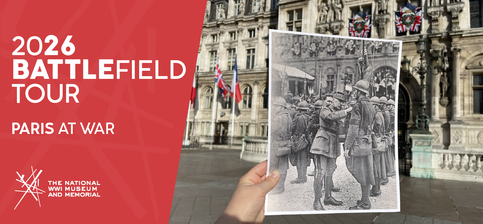 Modern photo of an ornate stone façade. Someone's hand is holding up a black and white historical photograph of the same building with troops lined up for inspection by a general.