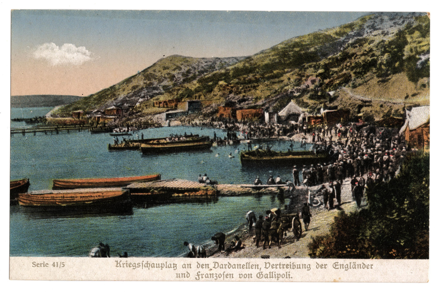 Scan of a colorized photograph depicting soldiers gathered on a beach and boarding onto boats