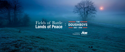 Background: photograph of an empty field and wood on a misty night. Text: Fields of Battle Lands of Peace: The Doughboys 1917-1918