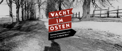 Background: black and white photograph of a rural wooded field with the photographer's shadow visible on the ground. Text: 'Wacht Im Osten'