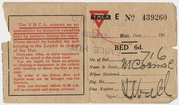 Scan d'un billet jaunissant imprimé avec le logo YMCA, des informations sur le lit n° 716, le soldat occupant le lit et une clause de non-responsabilité concernant l'argent et les objets de valeur.