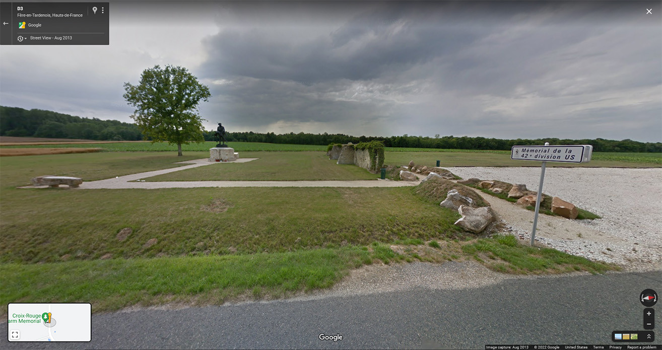 Google Street View لمنطقة صغيرة تشبه المنتزه بشجرة وحيدة.
